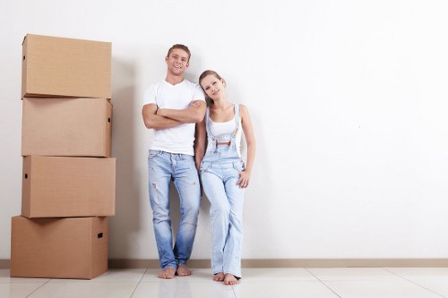 Professional local removals team loading a van in Plaistow