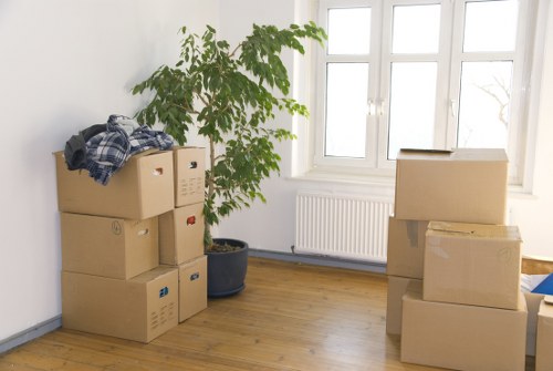 Professional movers handling furniture during a Plaistow relocation