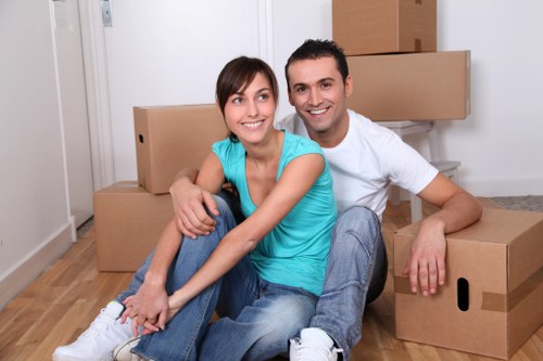 Packing office equipment and documents for a move in Plaistow