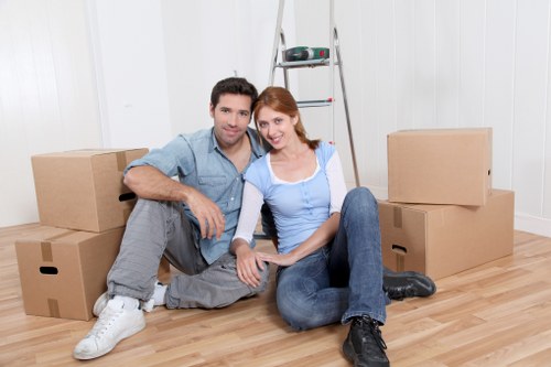 Careful loading of belongings into a removals vehicle in Plaistow